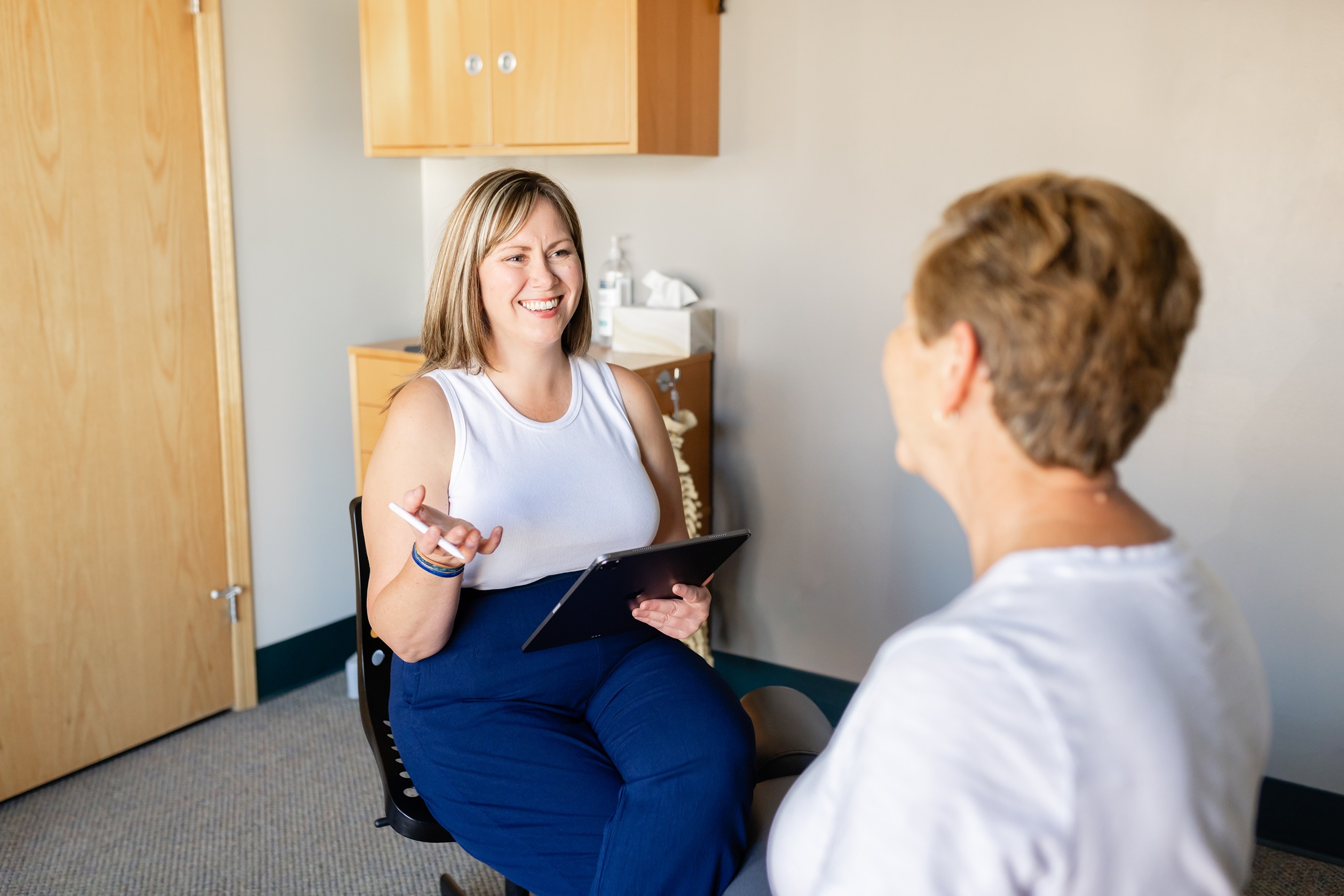 Dr. Zara chiropractic and massage patient check in